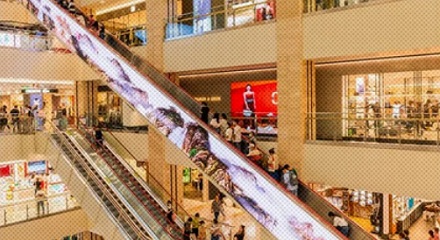 坐商场扶梯时，为什么经常要绕一大圈才能换乘下一段？